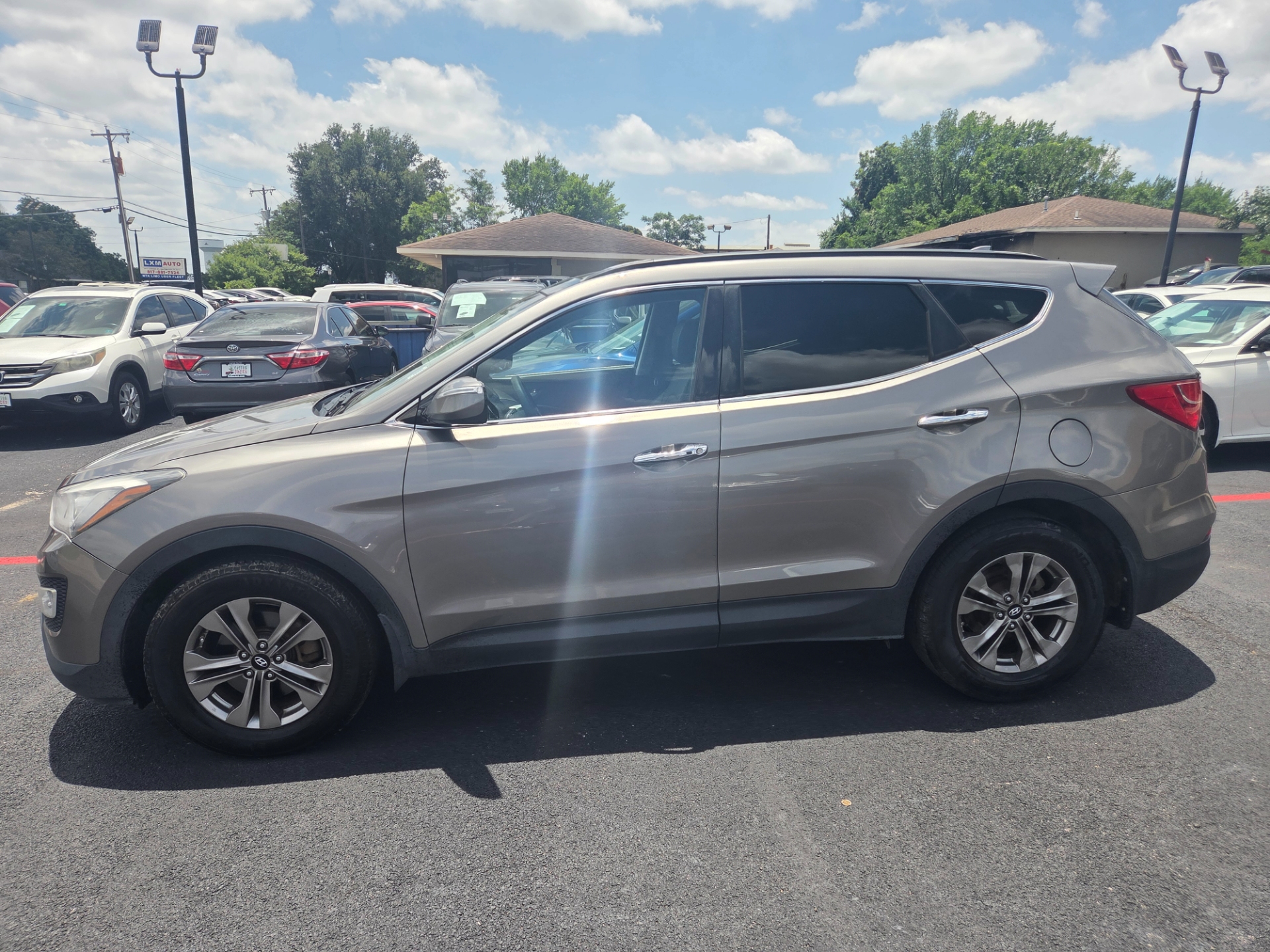hyundai santa fe 2015 5XYZU3LB4FG263119 image hyundai santa fe 2015 5XYZU3LB4FG263119 image
